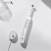 Oral-B Genius X elektromos fogkefe Cross Action fejjel - Fehér